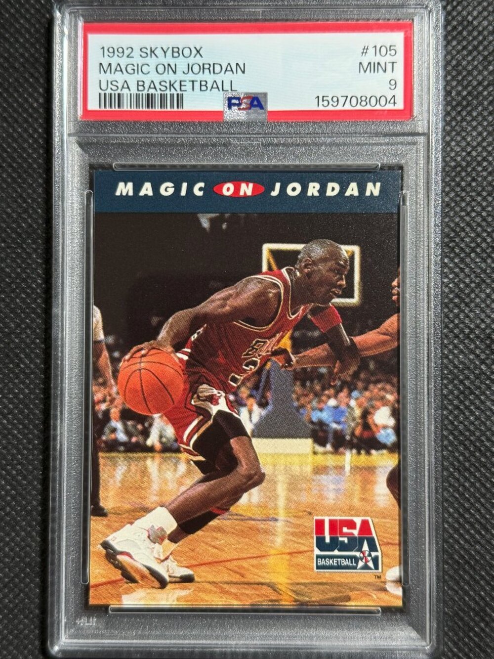 1992 SKYBOX USA BASKETBALL CARD #105 HOF MICHAEL JORDAN ON MAGIC JOHNSON PSA 9